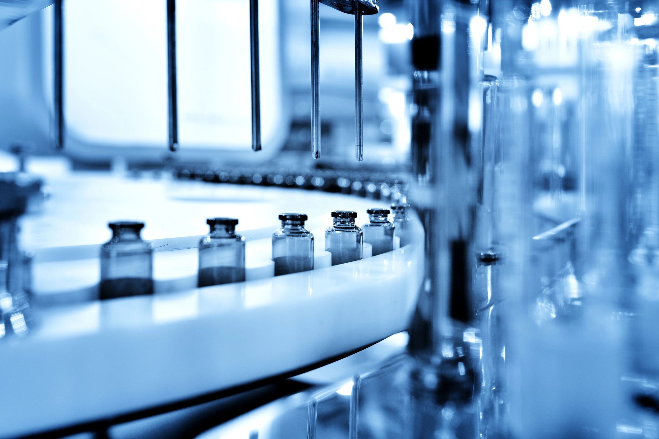 Sterile vial filling on a production line